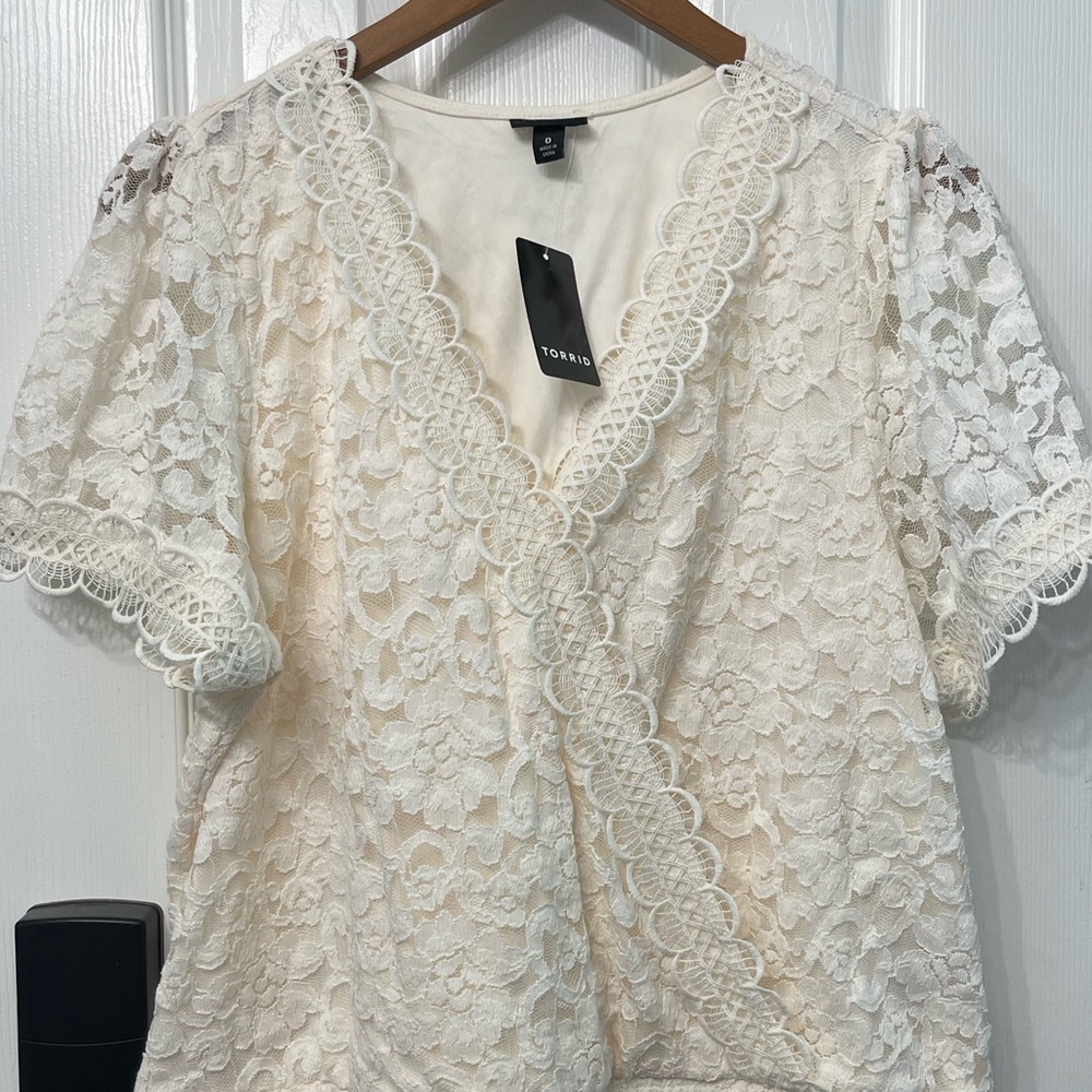 Torrid lace blouse. Lined.